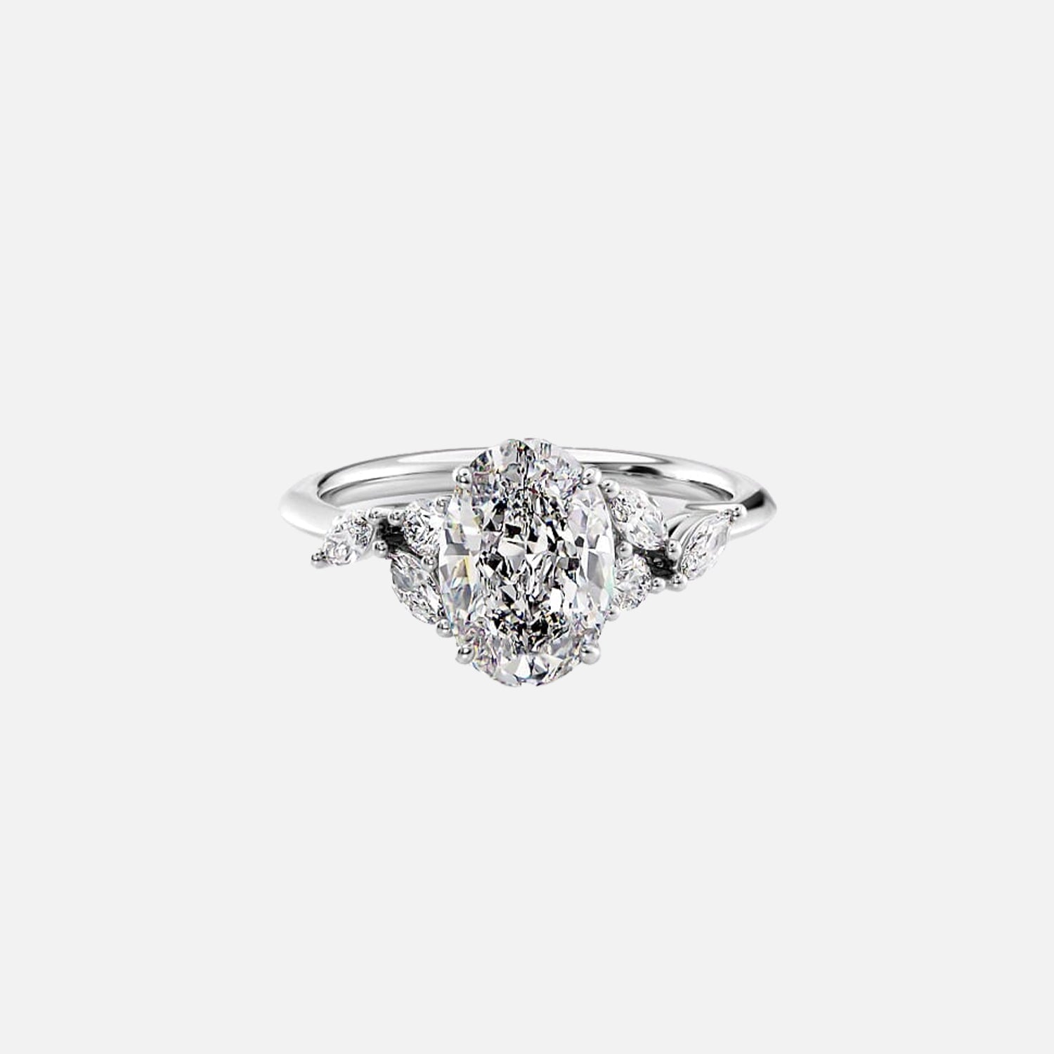 The Side Stone Daisy Oval Moissanite Ring - KNT - Engagement Rings, Wedding Bands & Fine Jewelry