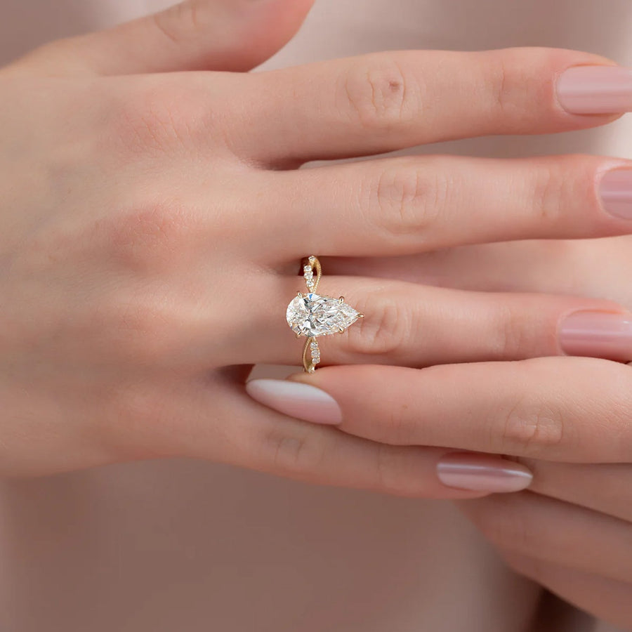  The Daisy Pear Moissanite Ring 18k Yellow Gold 004