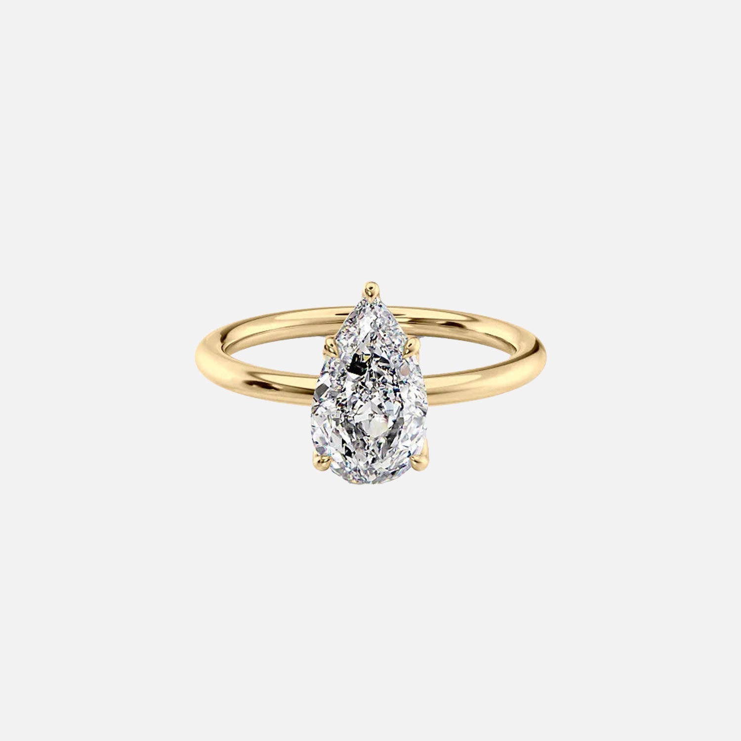 The Solitaire Alison Pear Moissanite Ring 14k Yellow Gold 001