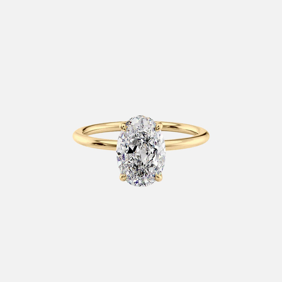  The Solitaire Crown Kamellie Oval Moissanite Ring 18k Yellow Gold 001