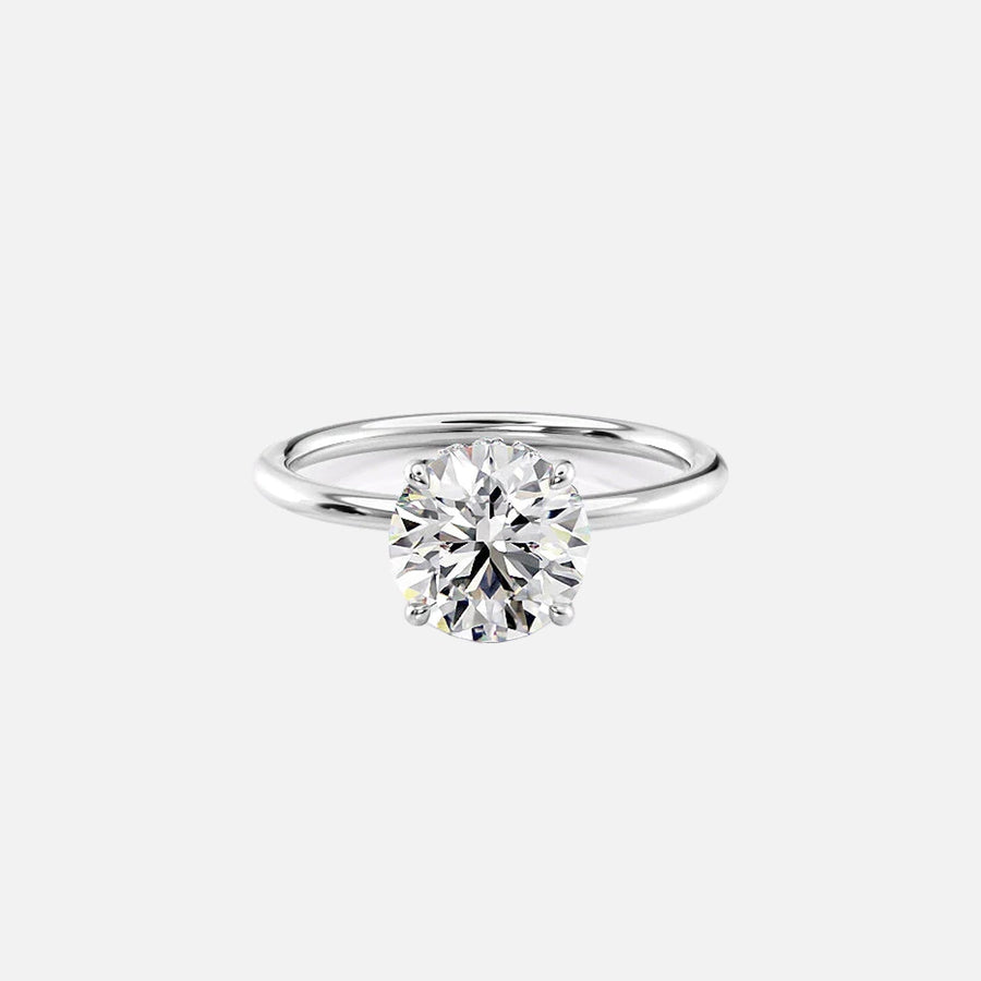  The Solitaire Crown Kamellie Round Moissanite Ring 14k White Gold 001