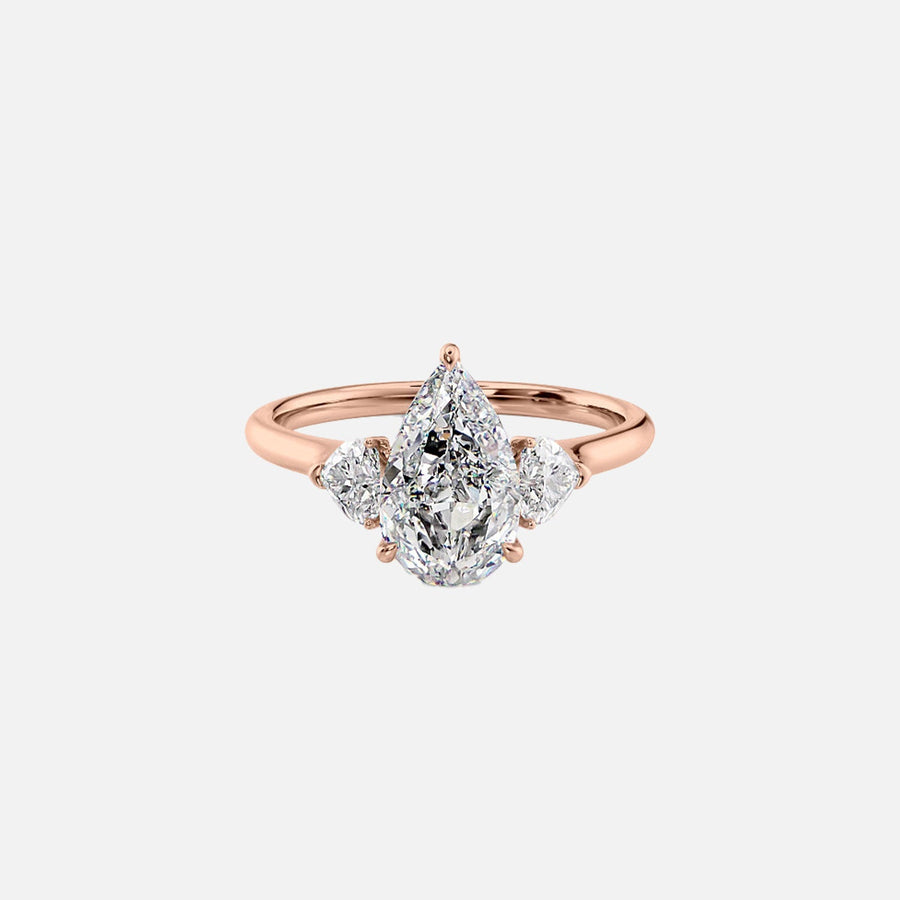  The Solitaire Hearts Liv Pear Moissanite Ring 14k Rose Gold 001
