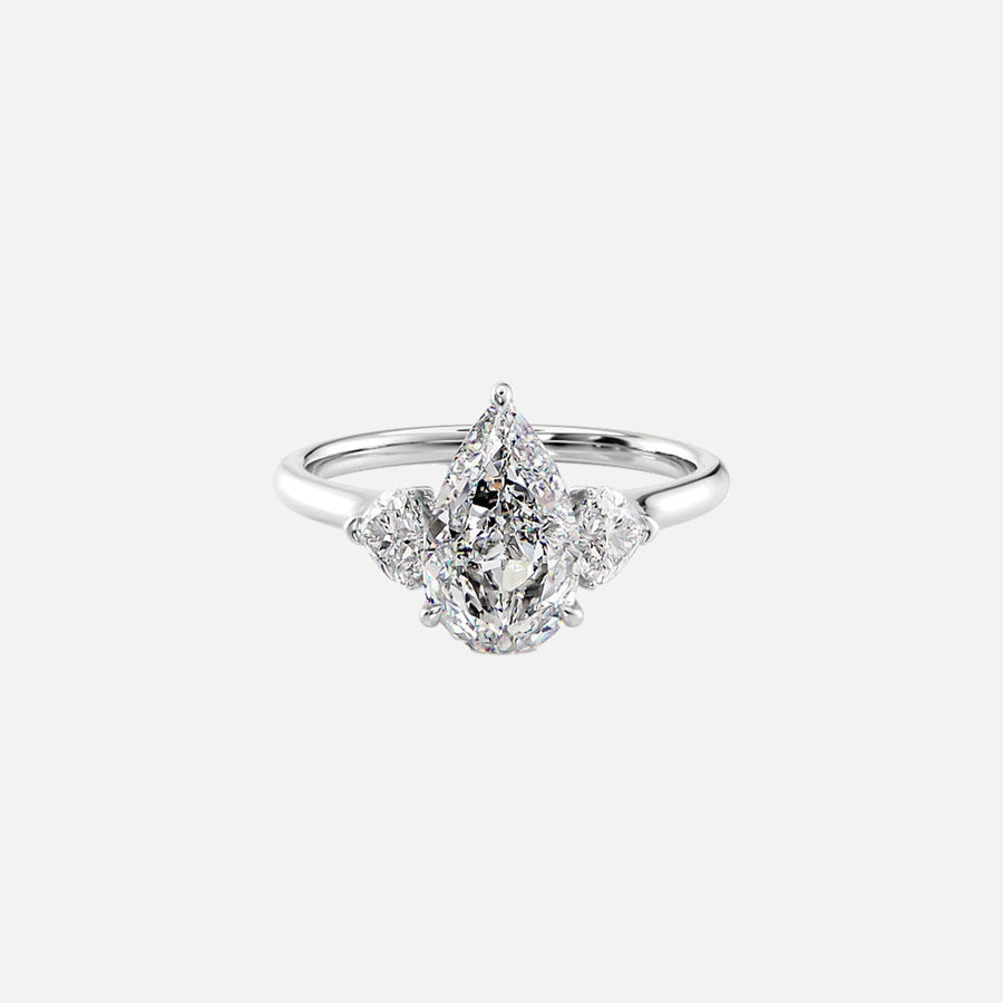  The Solitaire Hearts Liv Pear Moissanite Ring 18k White Gold 001
