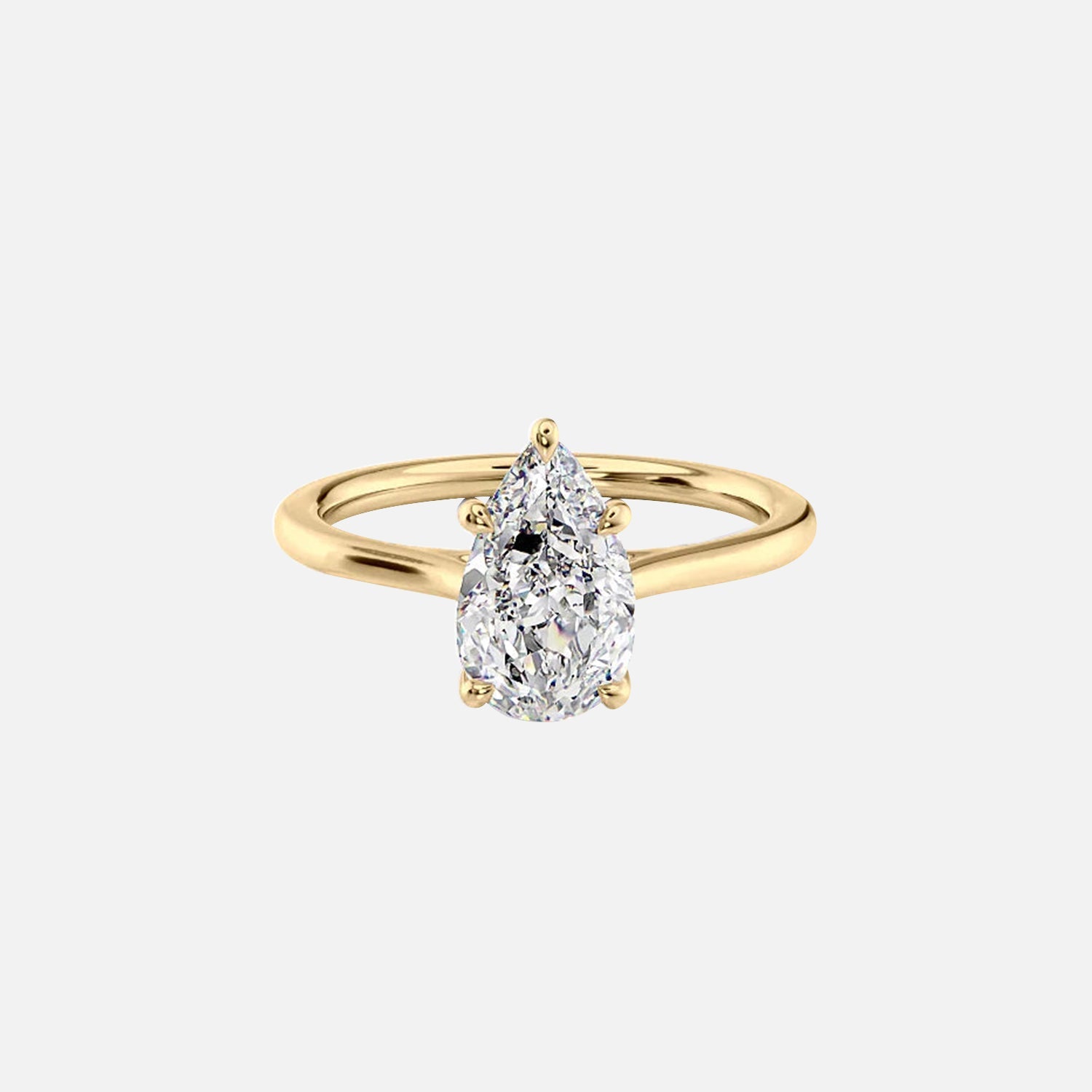 The Solitaire Lexie Pear Moissanite Ring 14k Yellow Gold 001