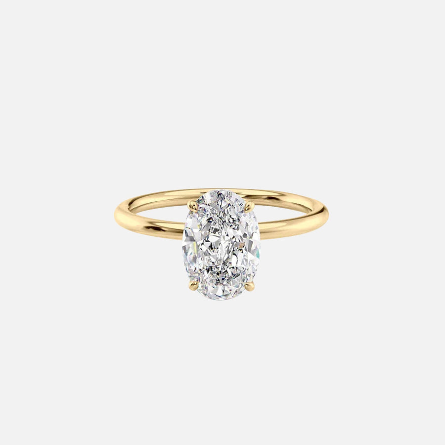 The Solitaire Lily Oval Moissanite Ring 18k Yellow Gold 001