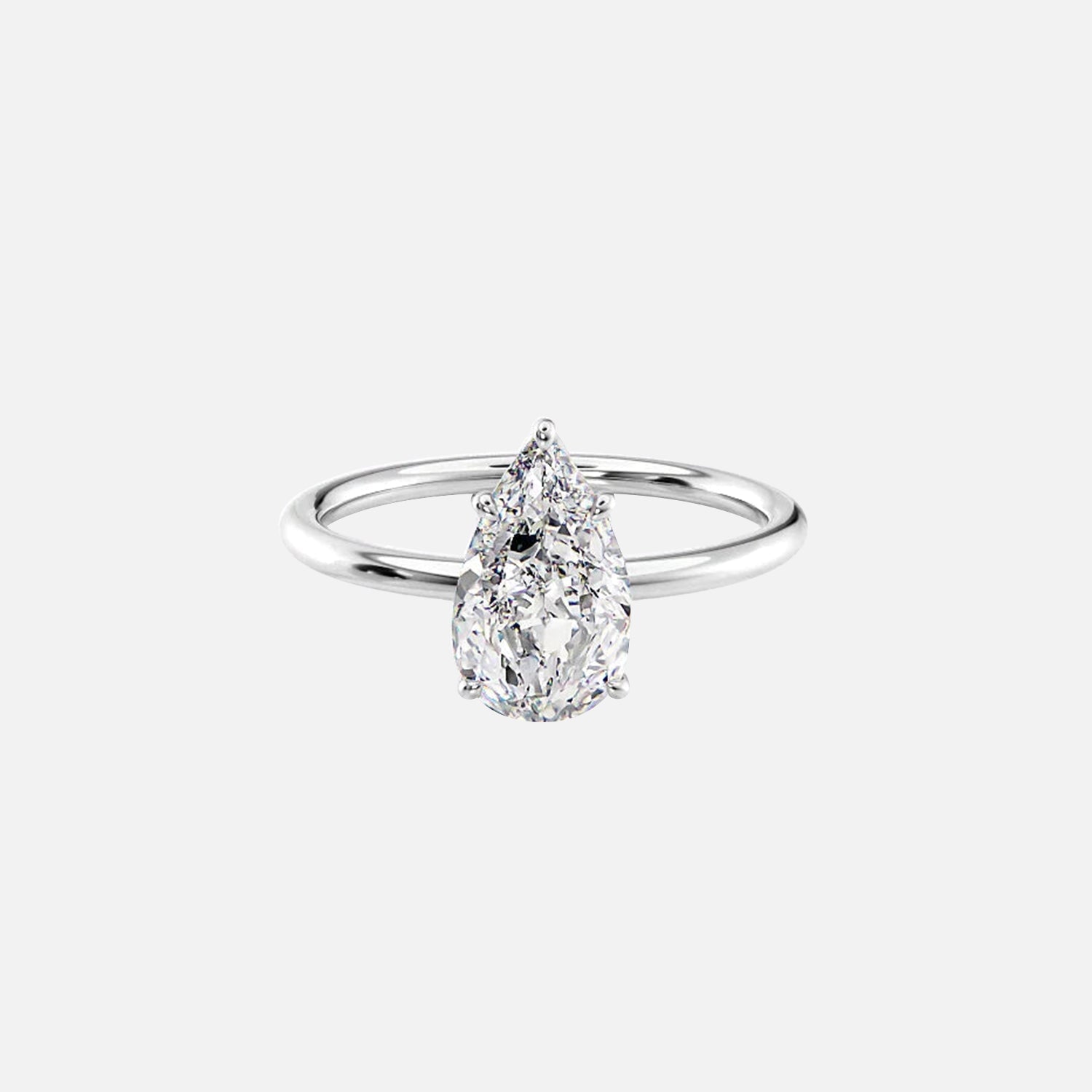  The Solitaire Lily Pear Moissanite Ring 14k White Gold 001