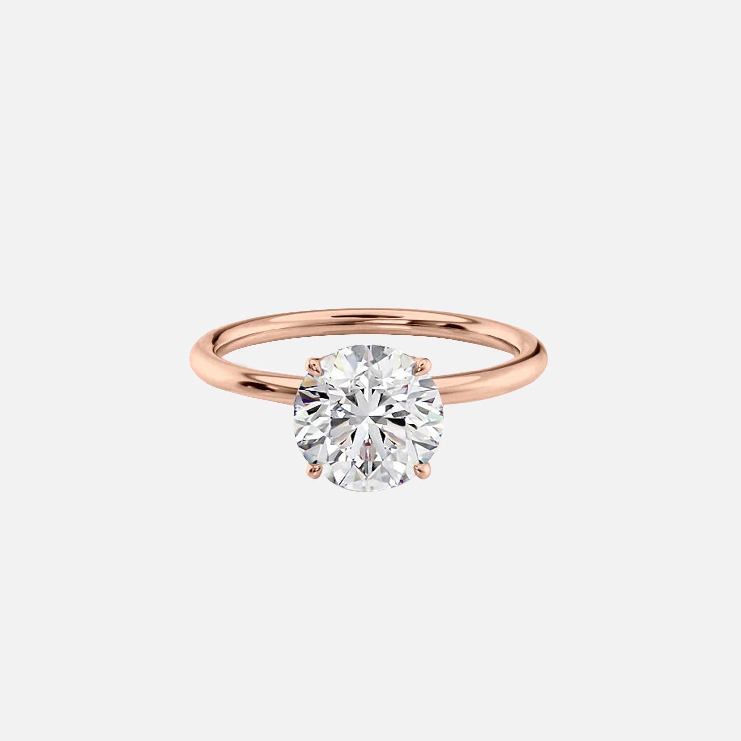  The Solitaire Lily Round Moissanite Ring 14k Rose Gold 001