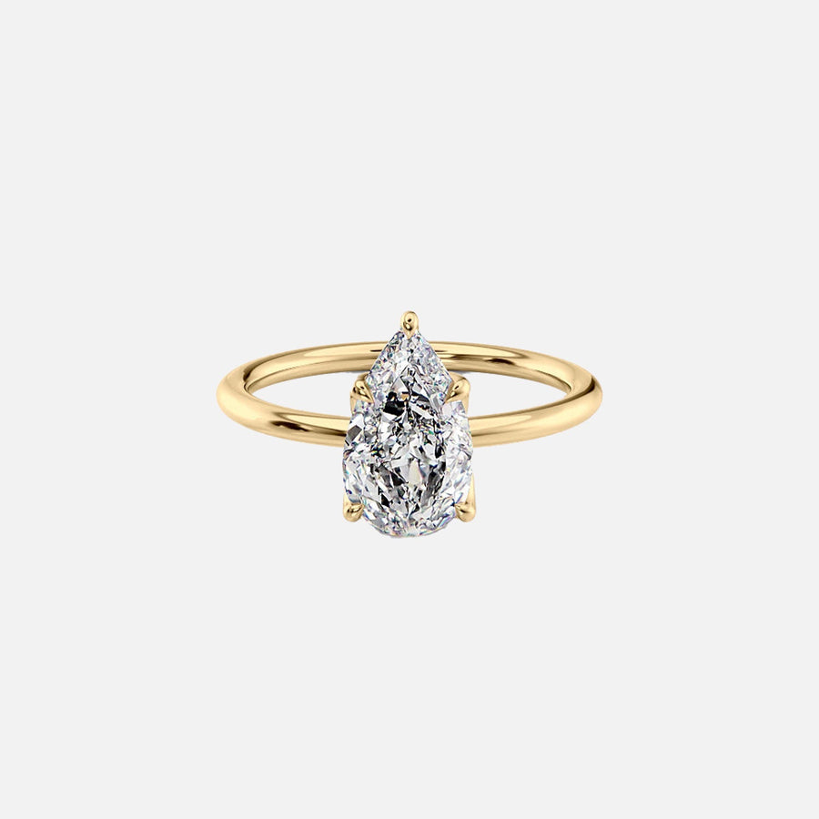 The Solitaire Lisa Pear Moissanite Ring 14k Yellow Gold 001