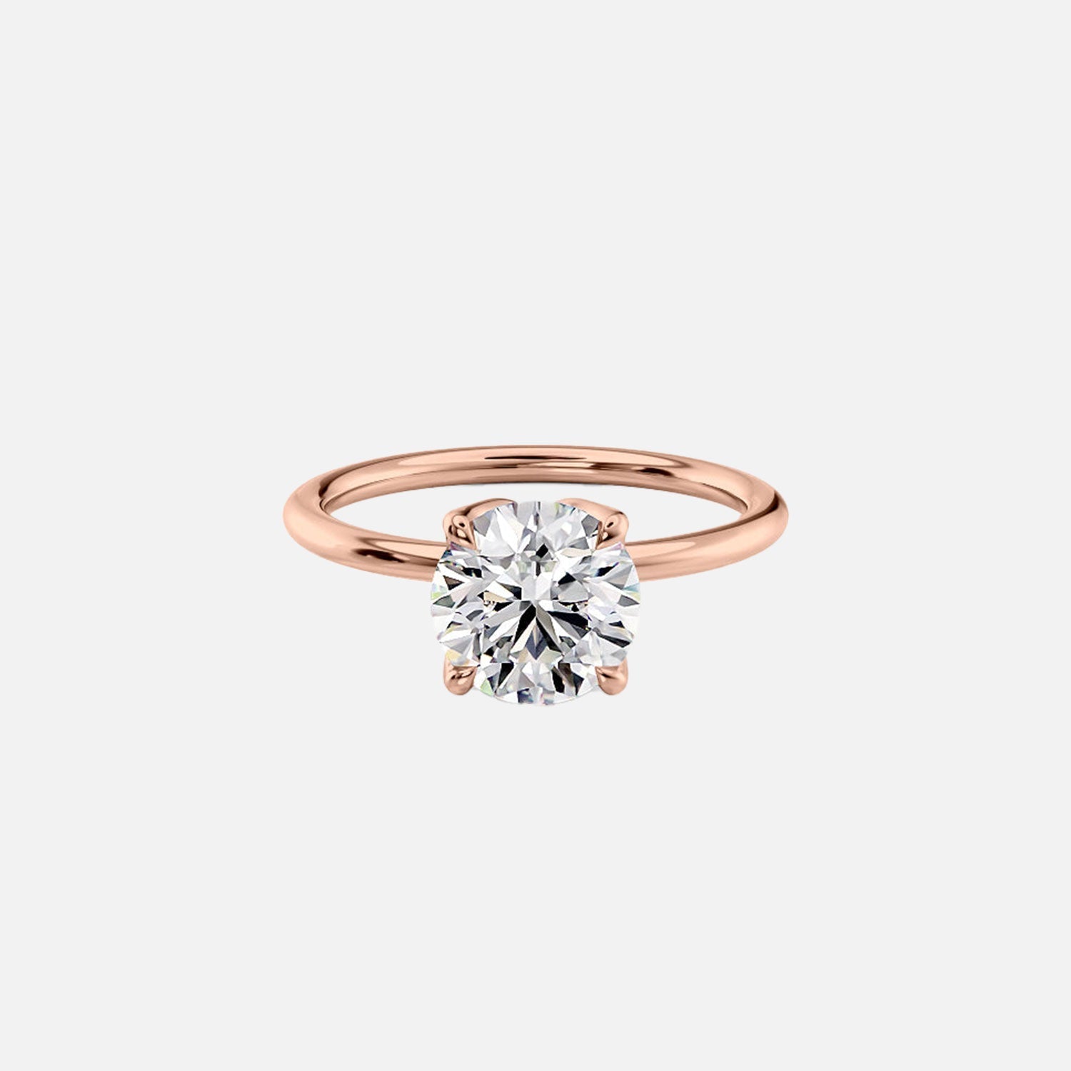 The Solitaire Lisa Round Moissanite Ring 14k Rose Gold 001