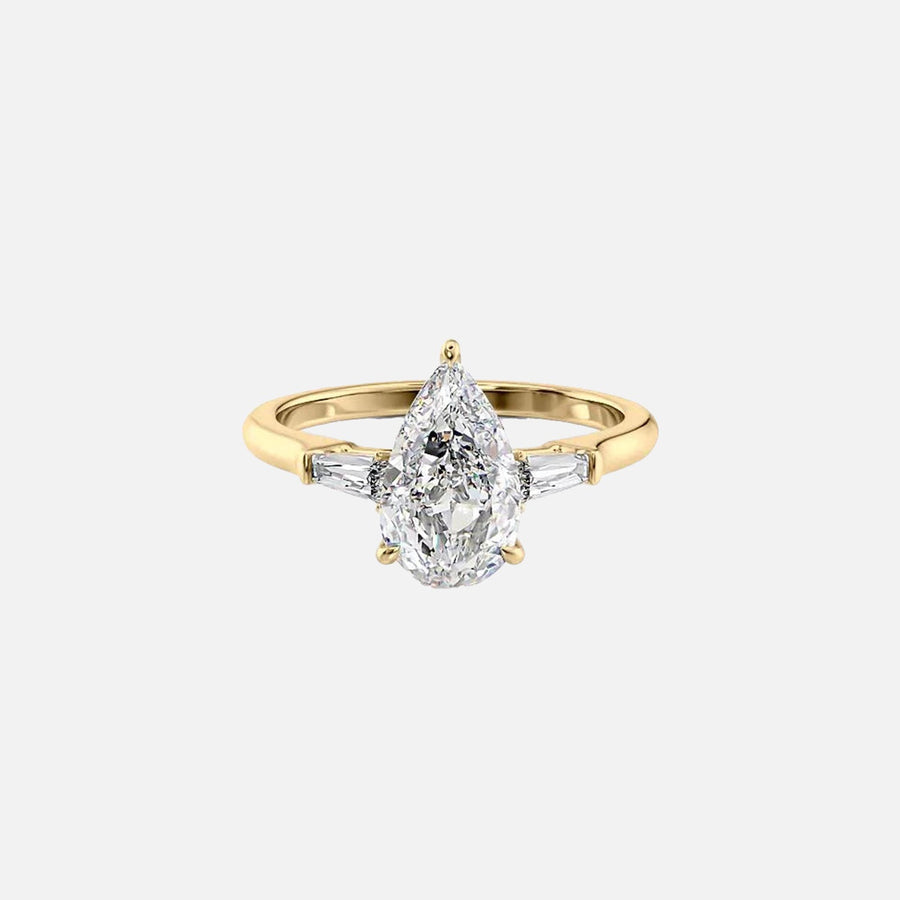  The Solitaire Liv Pear Moissanite Ring 18k Yellow Gold 001