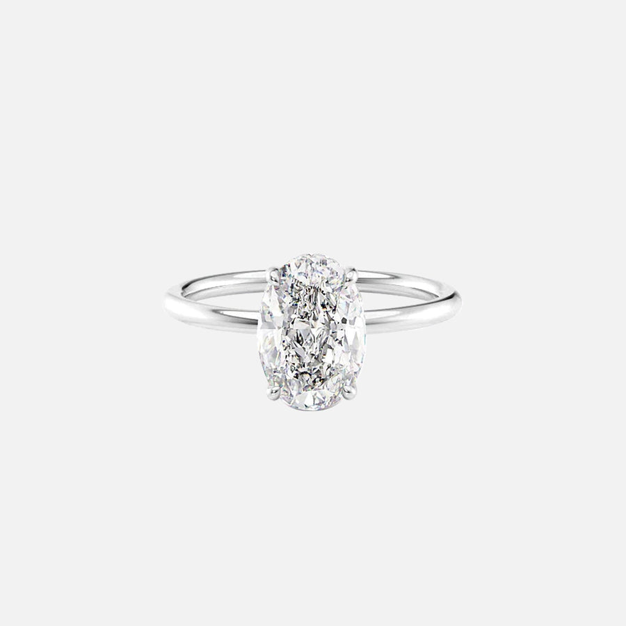  The Solitaire Low Profile Kamellie Oval Moissanite Ring 18k White Gold 001