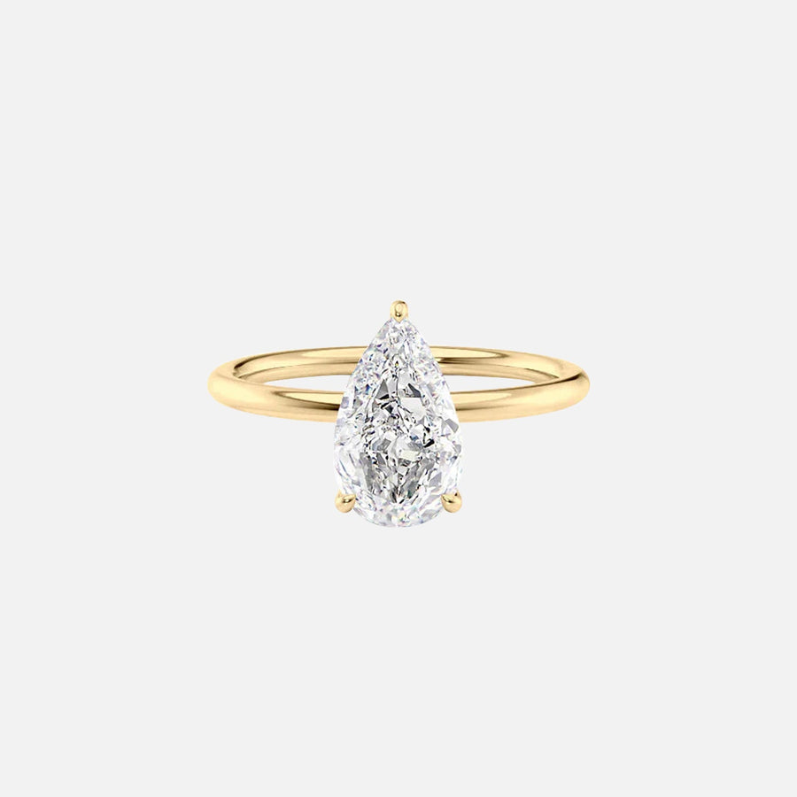  The Solitaire Low Profile Kamellie Pear Moissanite Ring 18k Yellow Gold 001