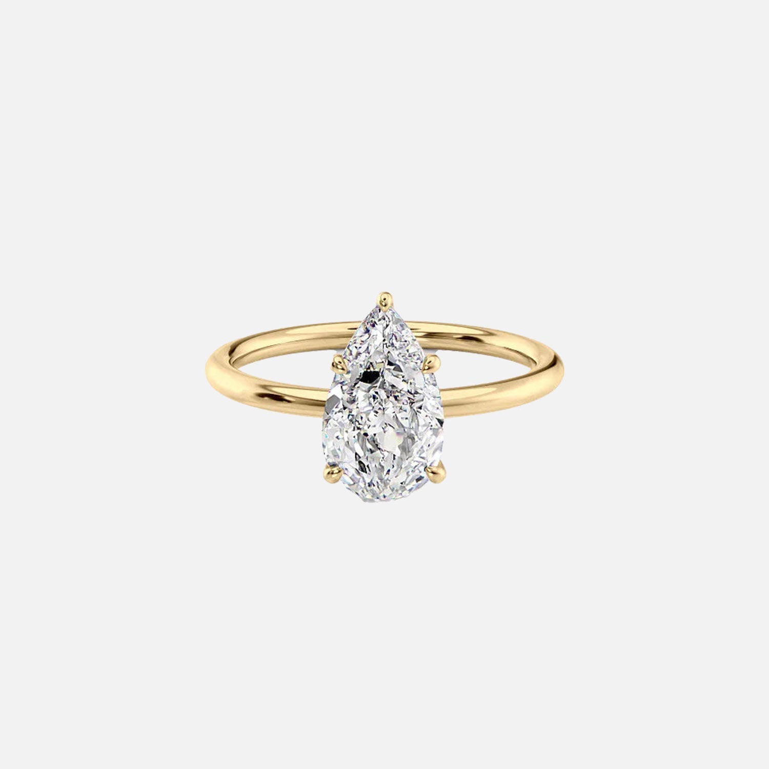 The Solitaire Luna Pear Moissanite Ring 14k Yellow Gold 001
