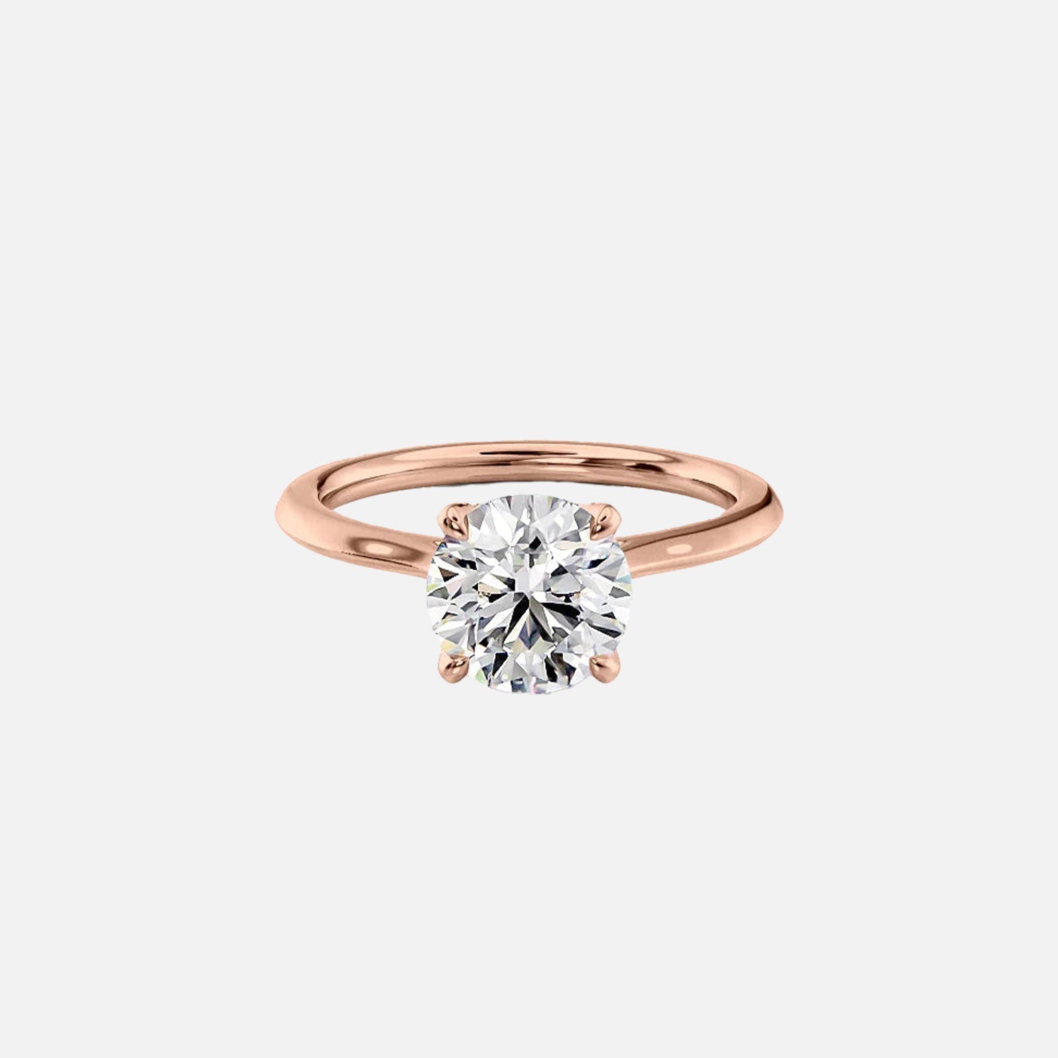  The Solitaire Madison Round Moissanite Ring 14k Rose Gold 001