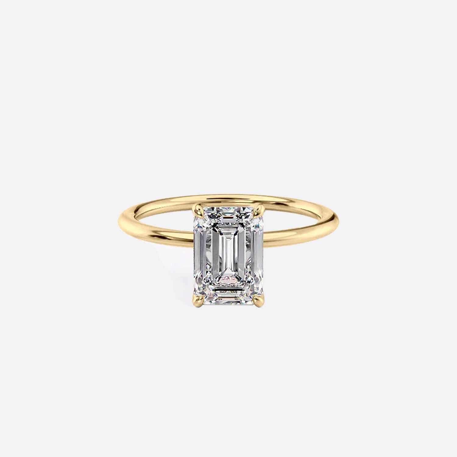 The Solitaire Maia Emerald Moissanite Ring 14k Yellow Gold 001