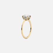  The Solitaire Maia Pear Moissanite Ring 14k Yellow Gold 002