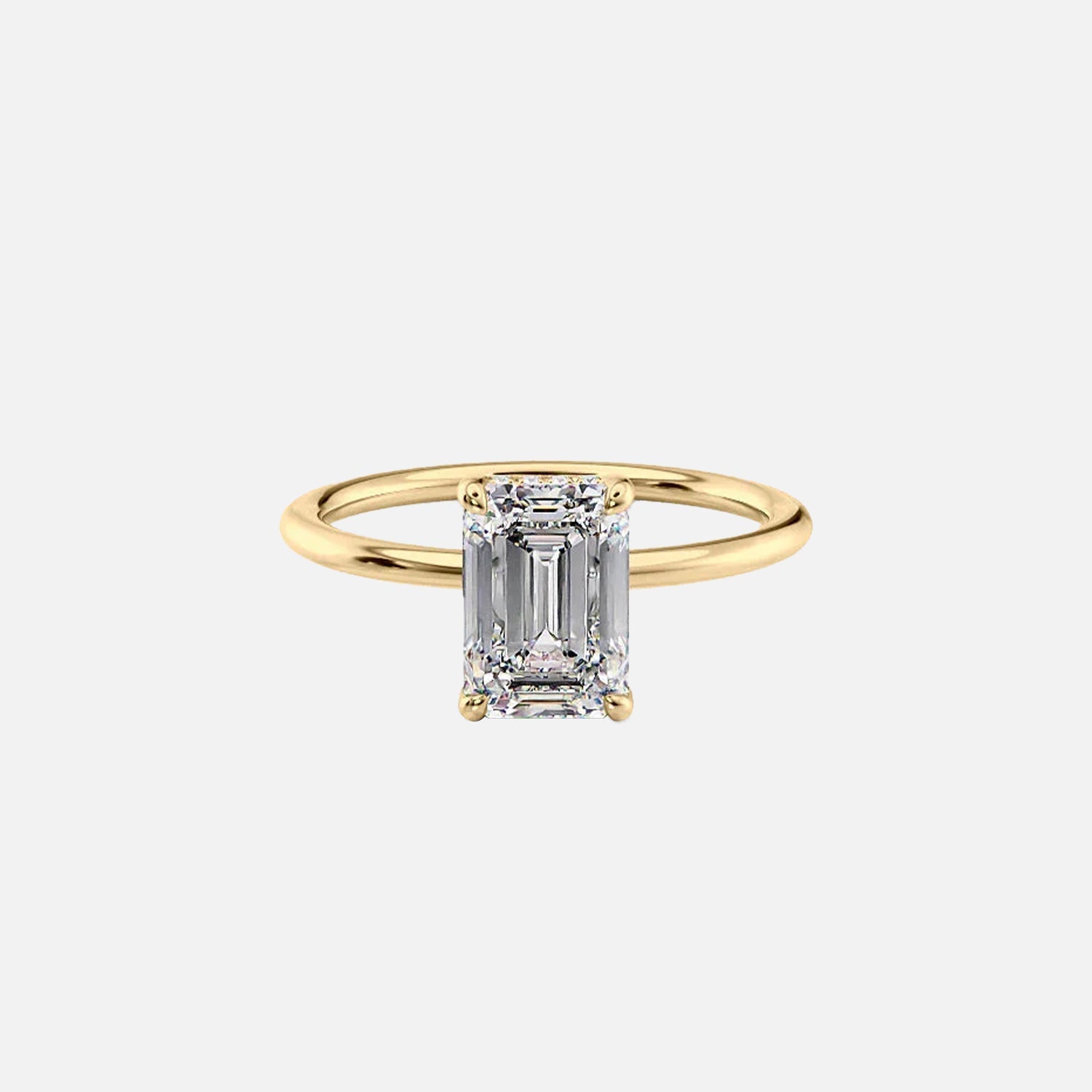 The Solitaire Margot Emerald Moissanite Ring 14k Yellow Gold 001