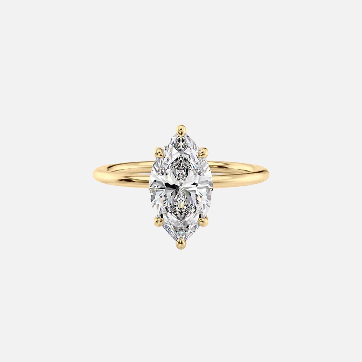 The Solitaire Margot Marquise Moissanite Ring 14k Yellow Gold 001