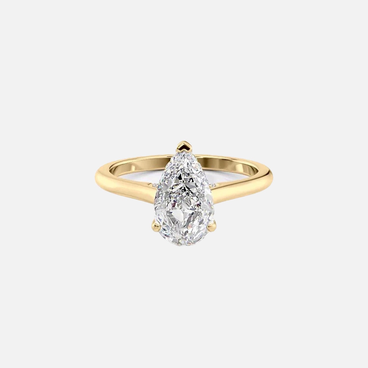 The Solitaire Natalie Pear Moissanite Ring 14k Yellow Gold 001
