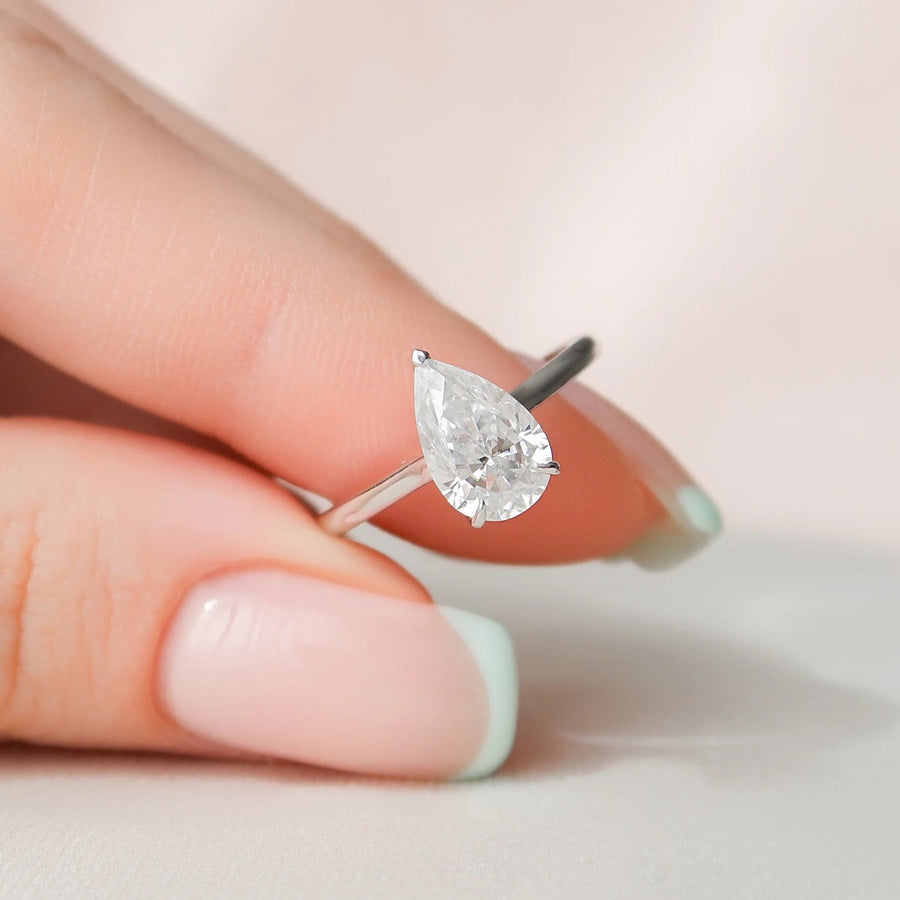 The Solitaire Natalie Pear Moissanite Ring 18k White Gold 003