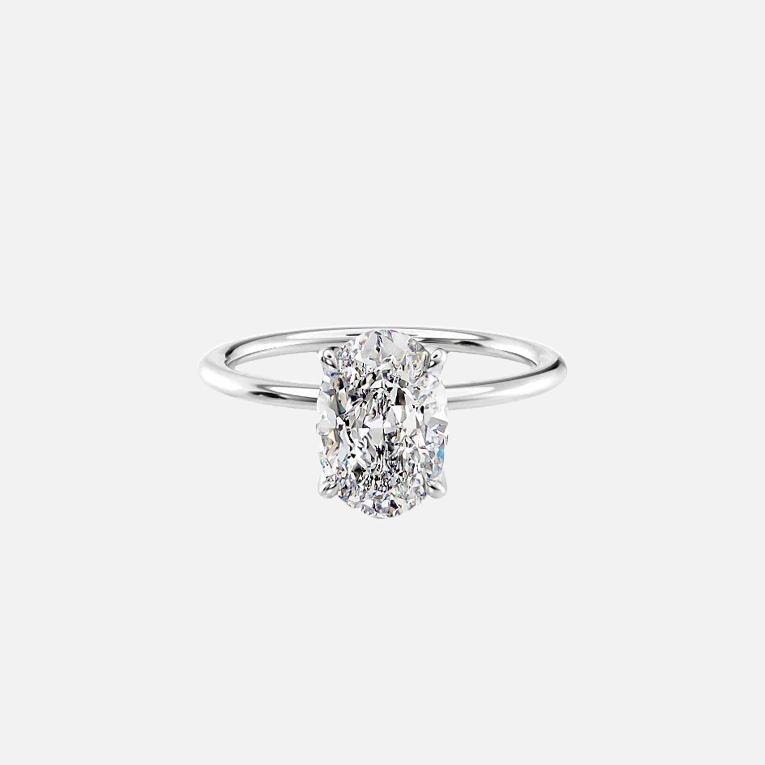  The Solitaire Nelly Oval Moissanite Ring 14k White Gold 001