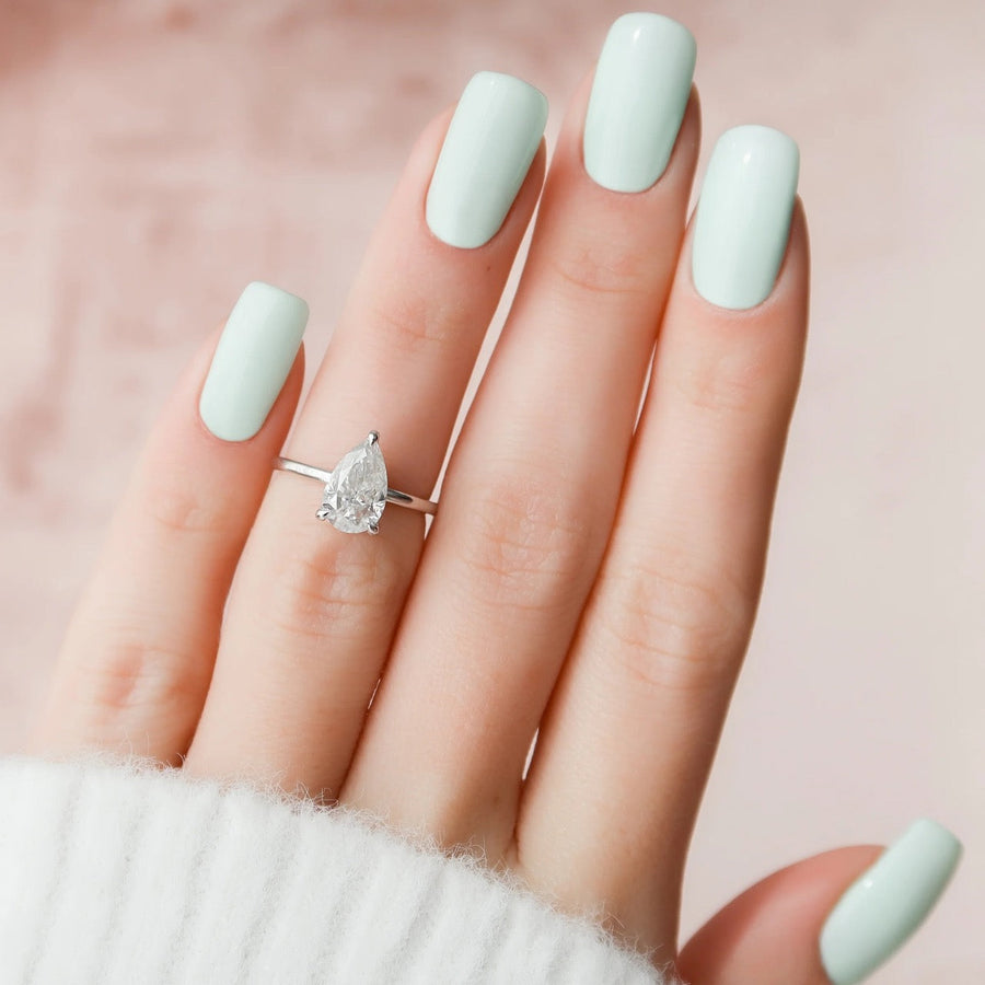  The Solitaire Nelly Pear Moissanite Ring 14k White Gold 003