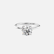  The Solitaire Nelly Round Moissanite Ring 14k White Gold 001