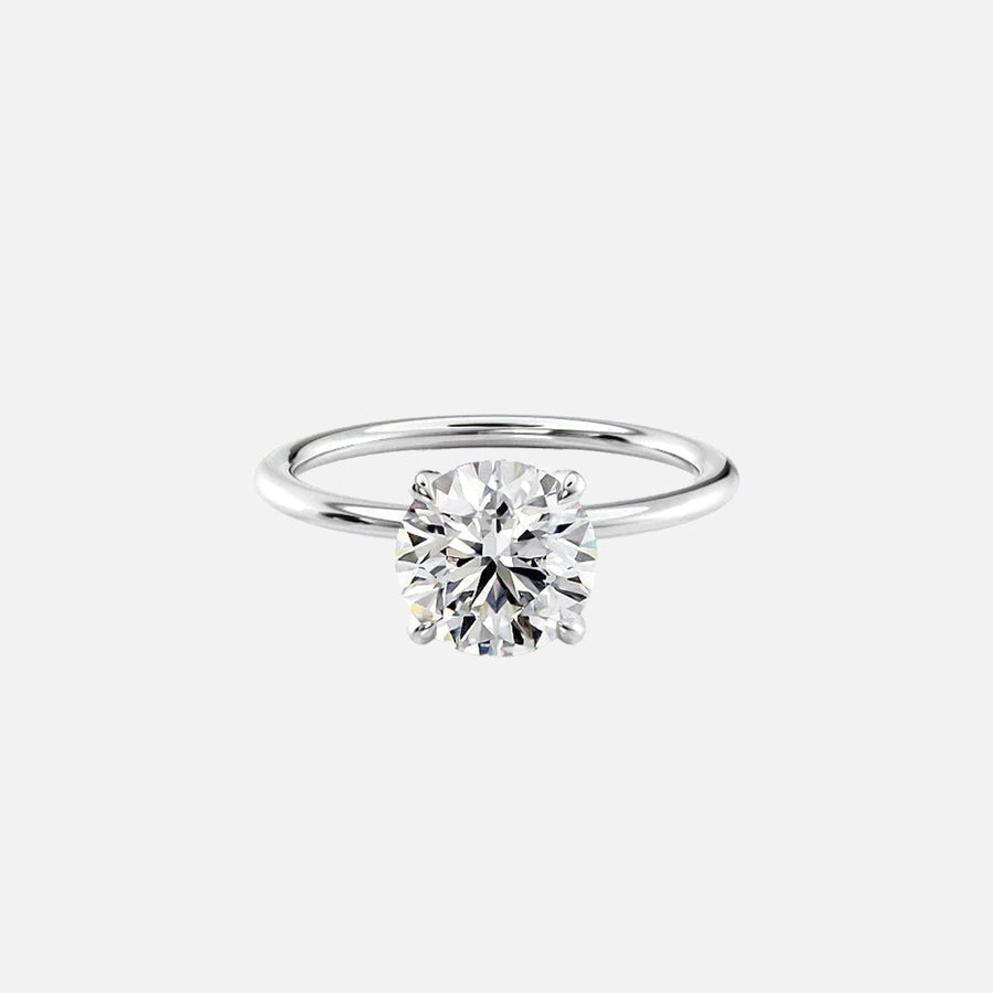  The Solitaire Nelly Round Moissanite Ring 14k White Gold 001