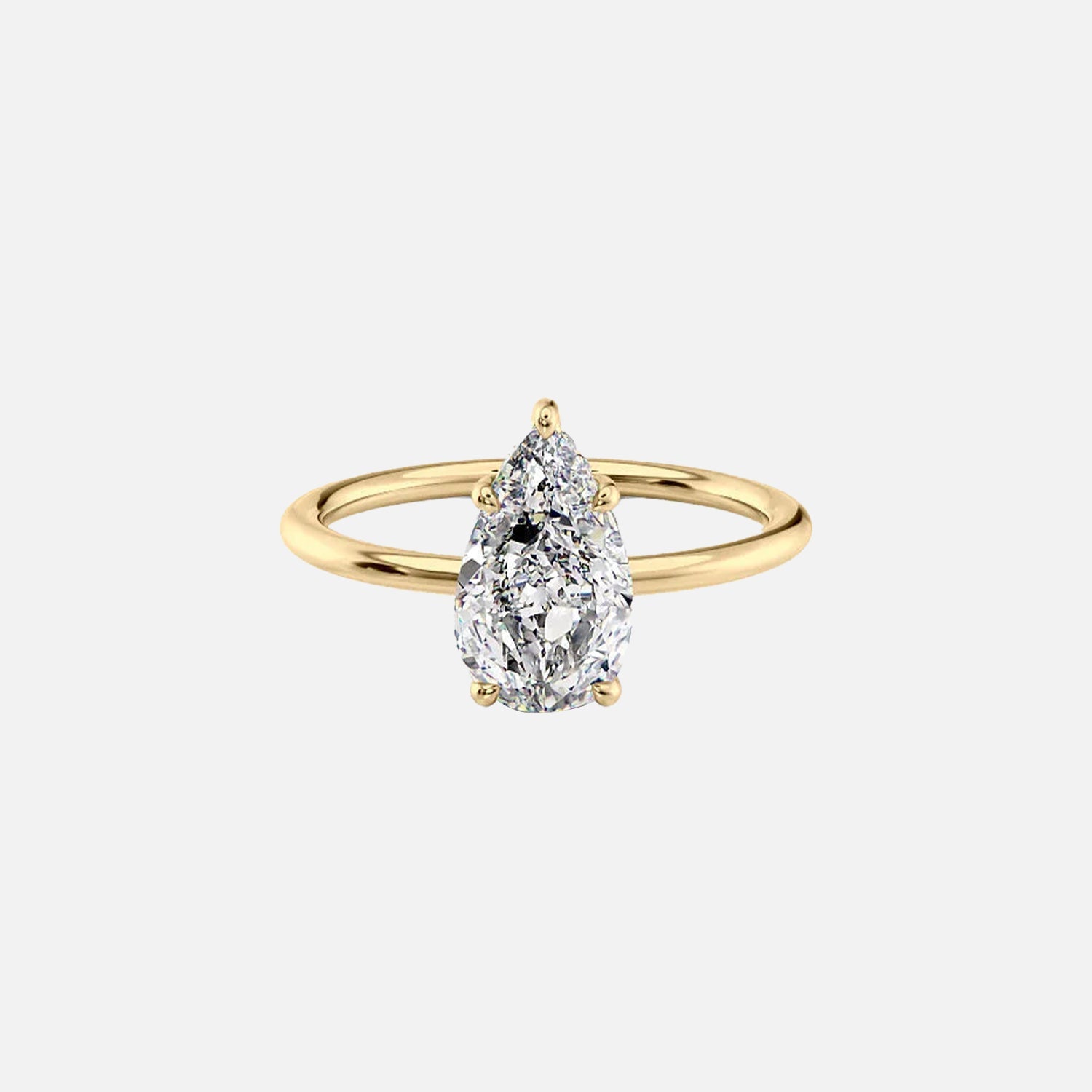 The Solitaire Sarah Pear Moissanite Ring 14k Yellow Gold 001