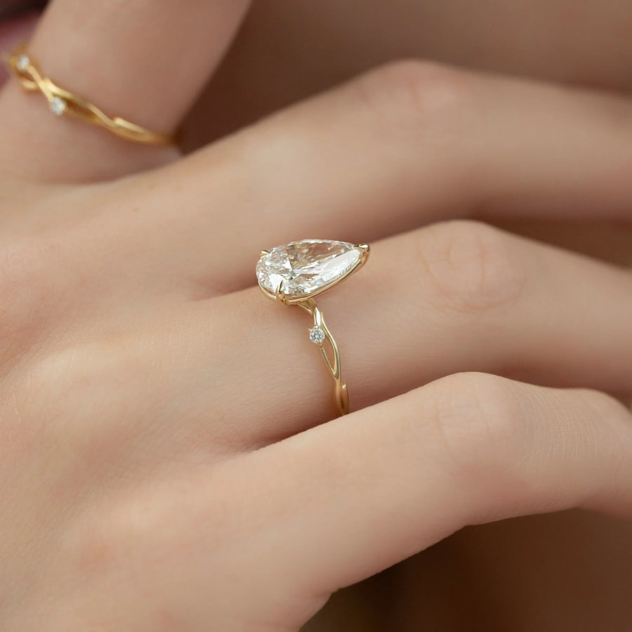  The Textured Twig Textured Pear Moissanite Ring 14k Yellow Gold 004