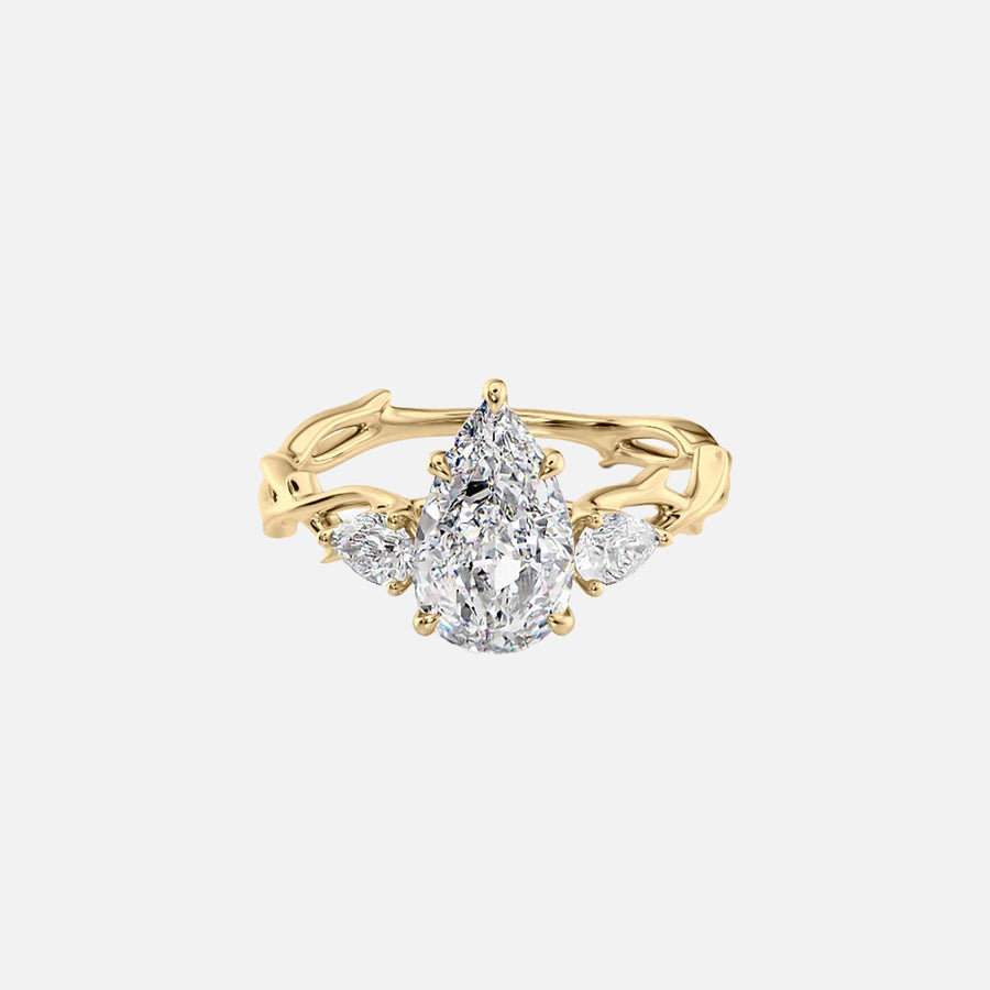 The Three Stone Twig Pear Moissanite Ring 14k Yellow Gold 001