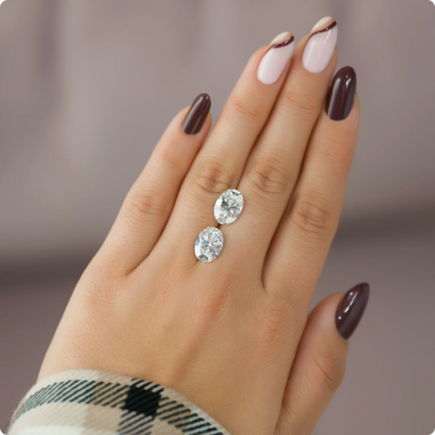 A 3.33-carat oval lab diamond (top) and a 3.5-carat oval natural diamond (bottom)
