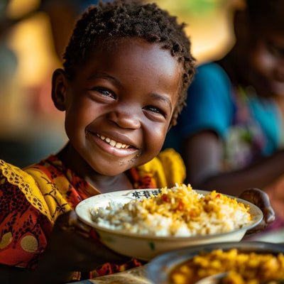 Happy child with meal