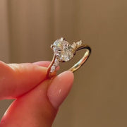 The Side Stone Elara Oval Moissanite Ring